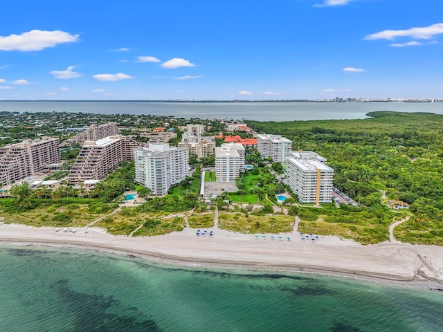 aerial view featuring a water view and a view of the beach