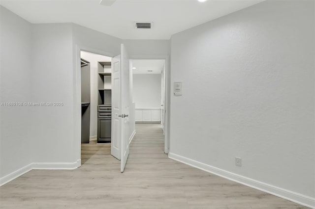 hall featuring light hardwood / wood-style flooring