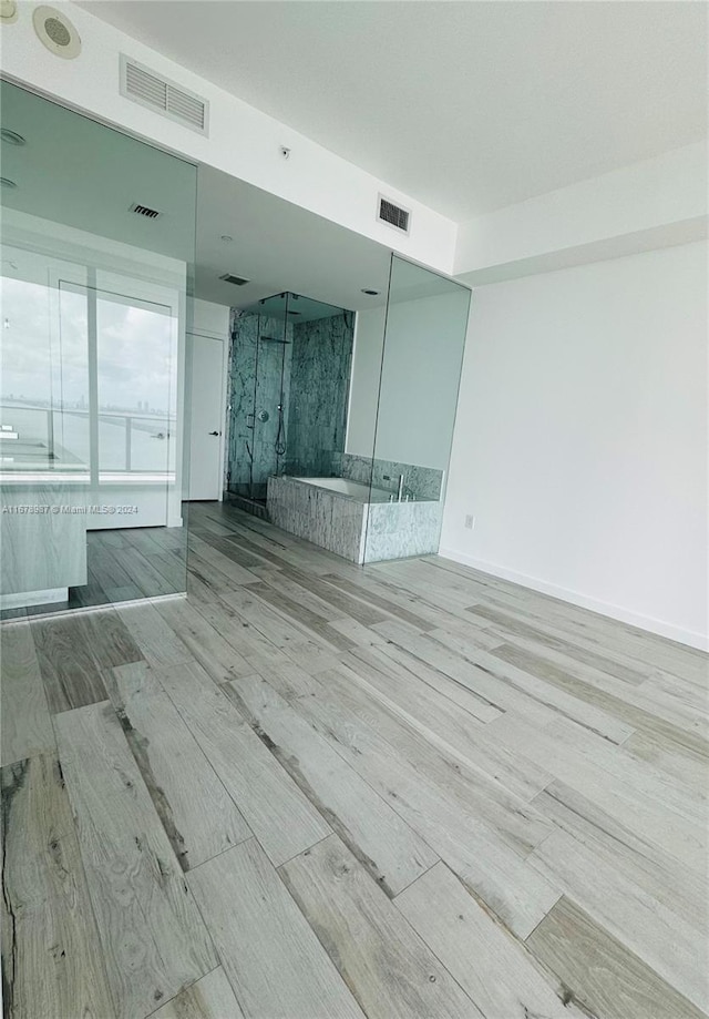 empty room featuring light hardwood / wood-style floors