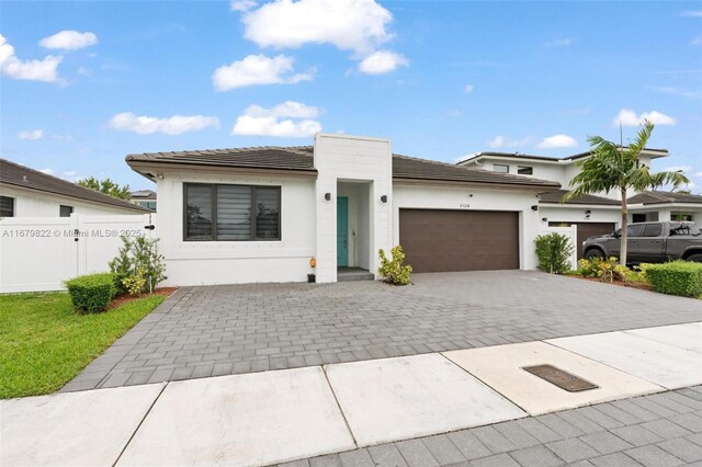 view of front of home featuring a garage