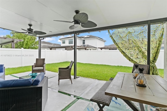 view of patio / terrace with ceiling fan and outdoor lounge area