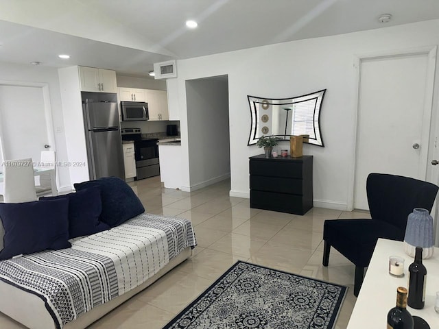 living room featuring vaulted ceiling