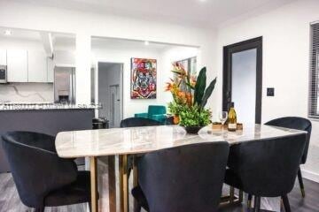 4384 SW 12th St, Miami, FL 33134 - dining room featuring hardwood / wood-style floors