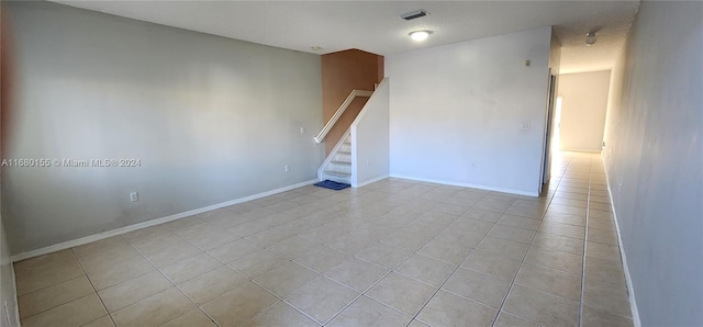 view of tiled spare room