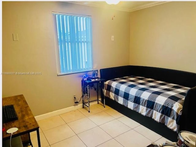 bedroom with light tile patterned flooring