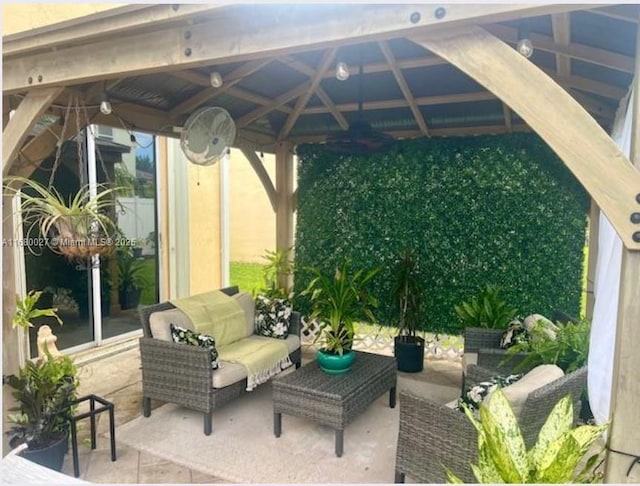 view of patio / terrace with a gazebo and an outdoor hangout area