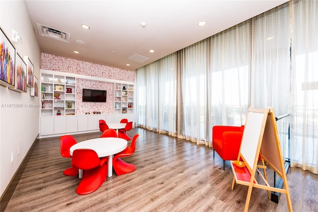 game room with hardwood / wood-style flooring