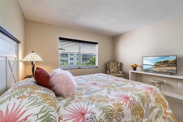 bedroom featuring a textured ceiling