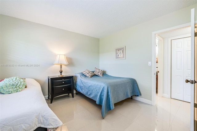 bedroom with a textured ceiling