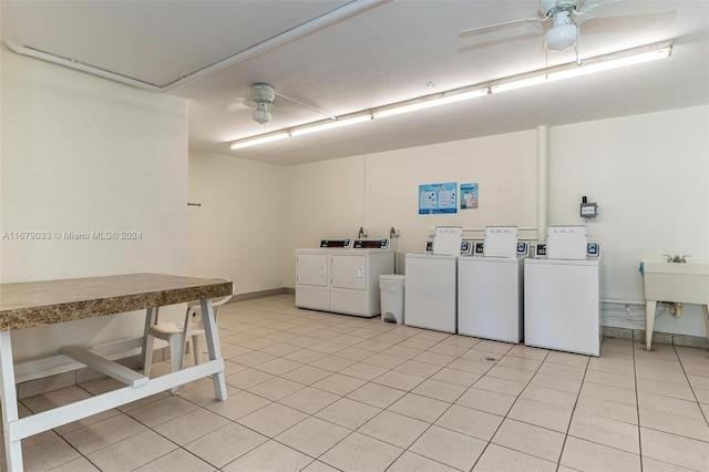 washroom featuring ceiling fan, washer and dryer, and light tile patterned floors