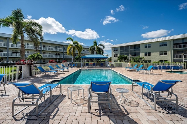 view of pool featuring a patio