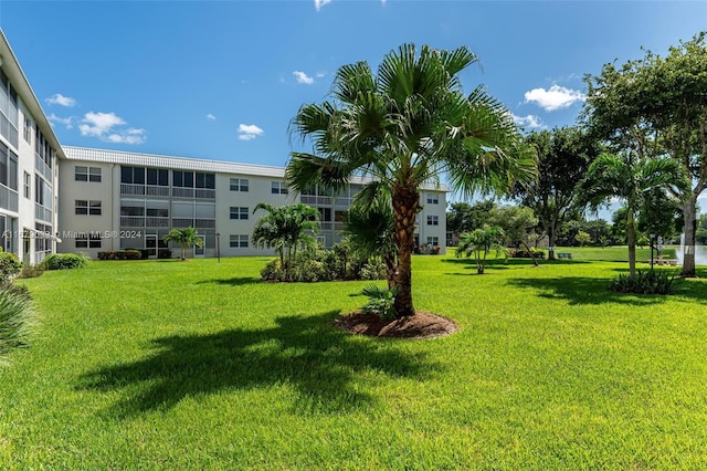 view of community with a lawn