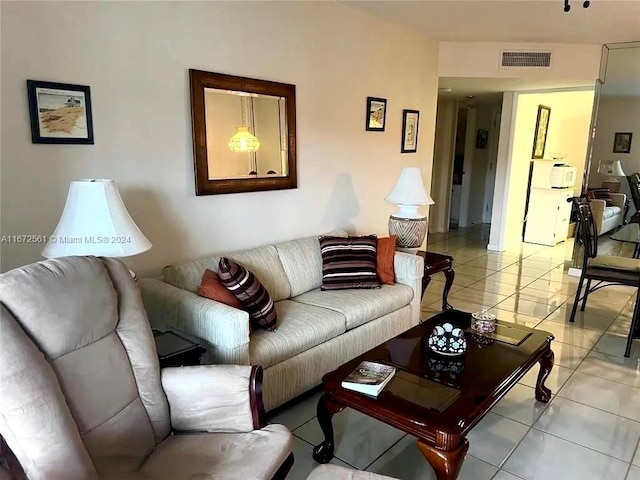 living room with light tile patterned floors