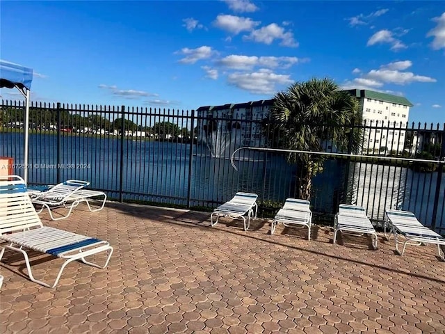 view of patio / terrace with a water view