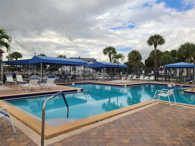 view of swimming pool featuring a patio area