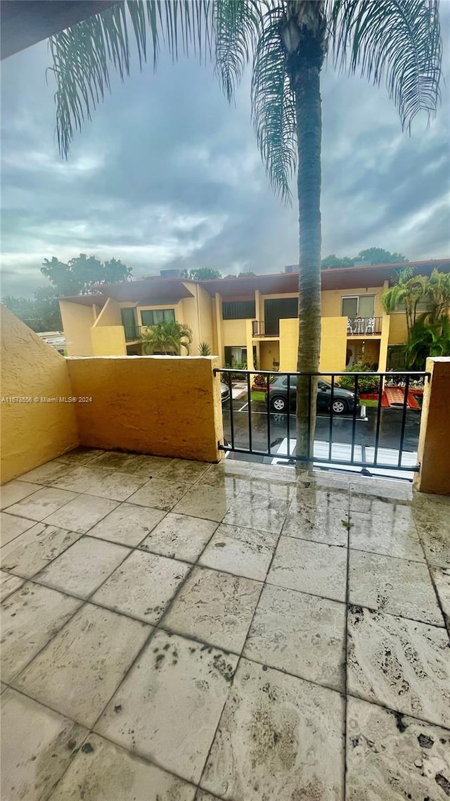 view of patio with a balcony