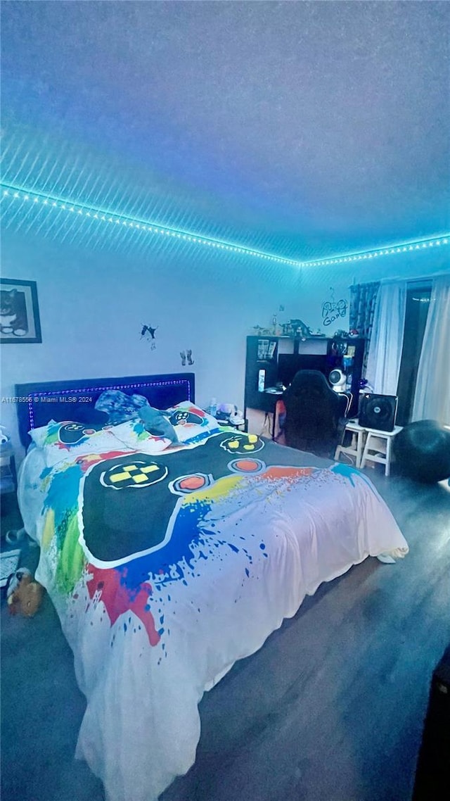 carpeted bedroom featuring a textured ceiling