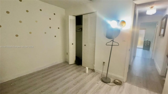 unfurnished bedroom with light hardwood / wood-style floors