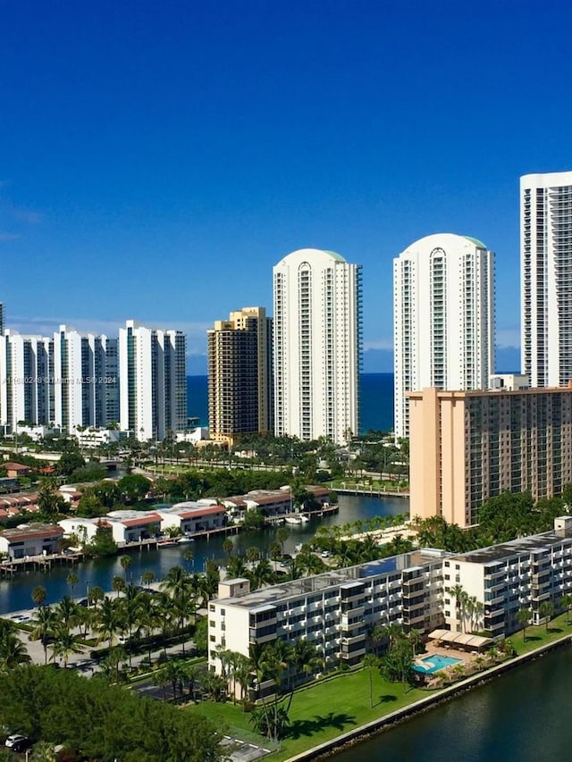 property's view of city featuring a water view