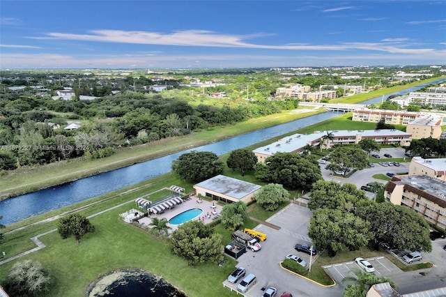 bird's eye view with a water view