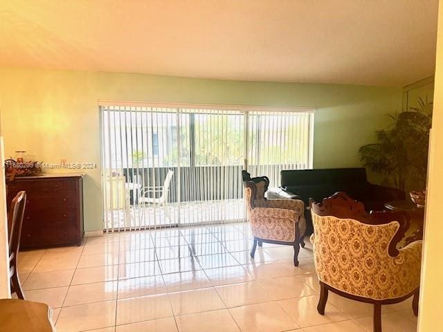 sitting room with light tile patterned flooring