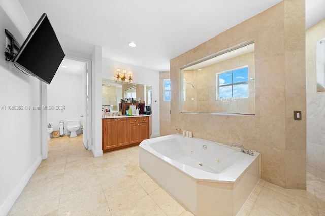 full bathroom with shower with separate bathtub, toilet, a bidet, vanity, and tile patterned flooring