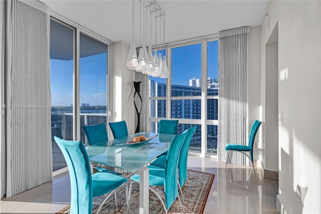 dining area featuring expansive windows