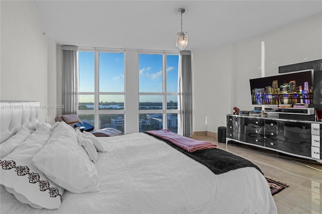 bedroom featuring a wall of windows