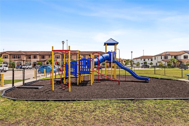 view of play area with a yard