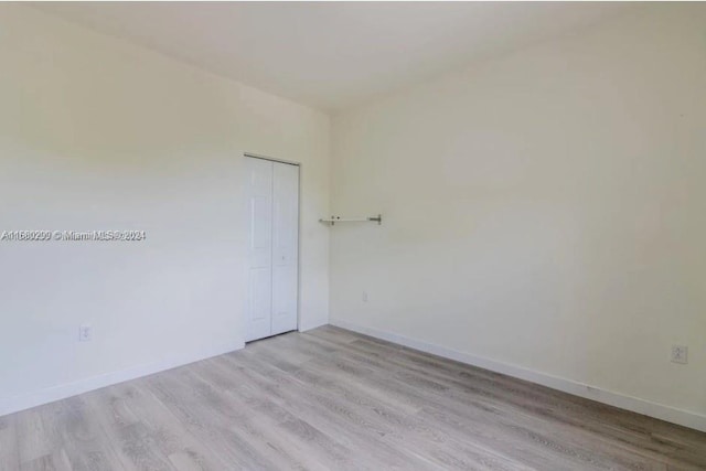 unfurnished room featuring light hardwood / wood-style flooring