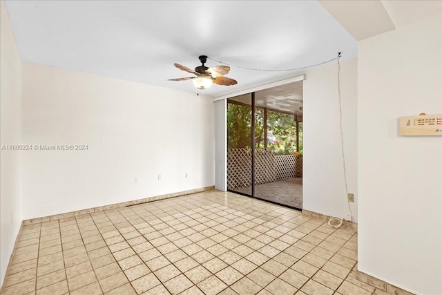 spare room with ceiling fan