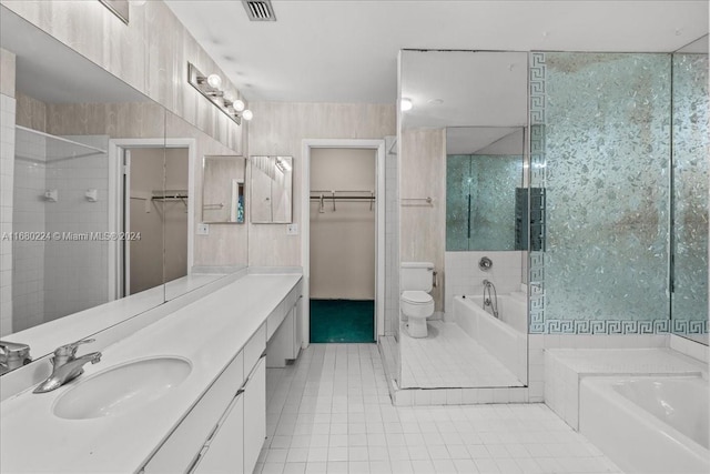 full bathroom featuring tile patterned flooring, vanity, tile walls, and independent shower and bath