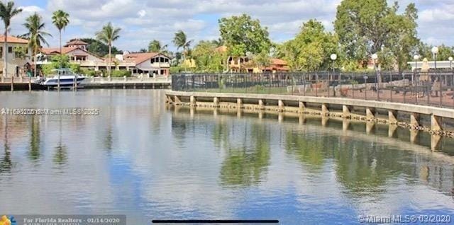 water view featuring a dock