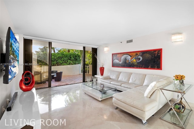 living room with a wall of windows