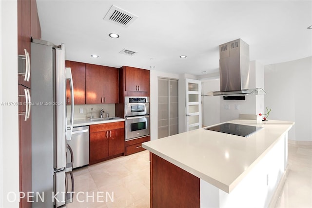 kitchen featuring island range hood, sink, light tile patterned flooring, and appliances with stainless steel finishes