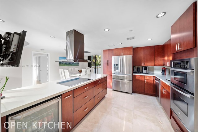 kitchen with wine cooler, island exhaust hood, and appliances with stainless steel finishes