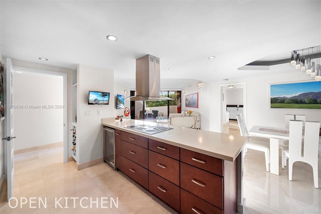 kitchen with light tile patterned flooring, kitchen peninsula, island exhaust hood, beverage cooler, and electric stovetop