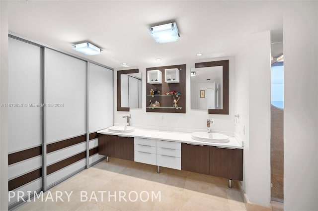 bathroom featuring vanity and tile patterned floors