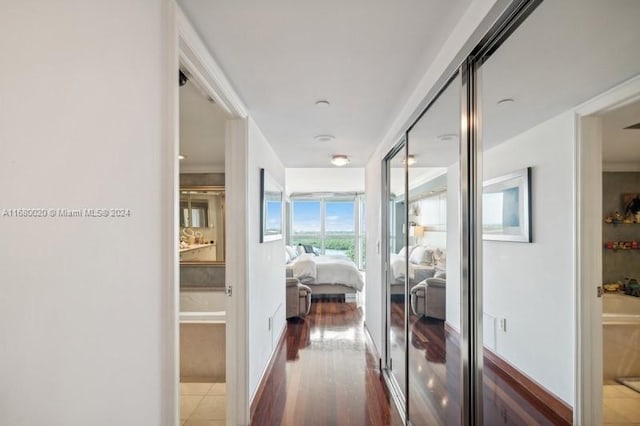 hallway featuring hardwood / wood-style floors