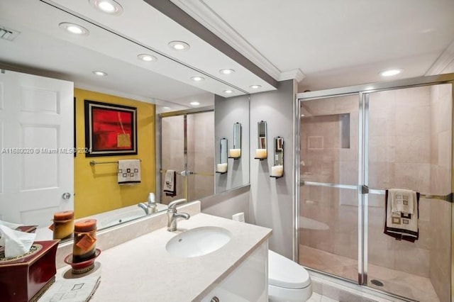 bathroom featuring a shower with door, toilet, ornamental molding, vanity, and tile patterned floors