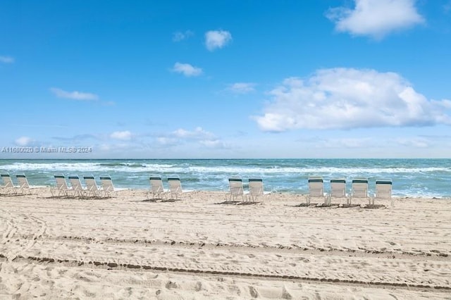 view of water feature with a beach view