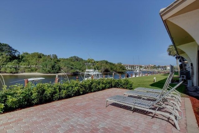 view of patio / terrace with a water view