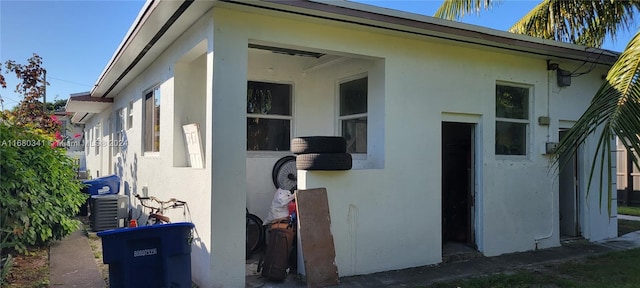 view of home's exterior with central air condition unit