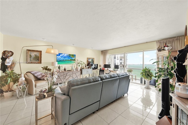 2451 Brickell Ave Unit 17G, Miami, FL 33129 - living area featuring light tile patterned floors and a textured ceiling