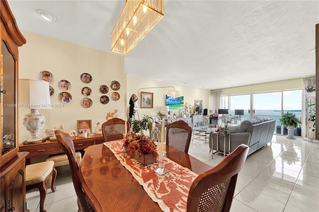 2451 Brickell Ave Unit 17G, Miami, FL 33129 - dining space with light tile patterned floors