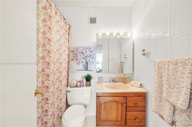 bathroom featuring vanity, a shower with curtain, and toilet