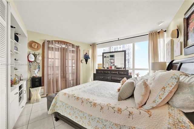 2451 Brickell Ave Unit 17G, Miami, FL 33129 - bedroom with tile patterned flooring