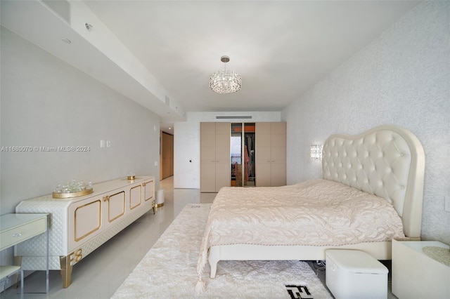 bedroom with an inviting chandelier