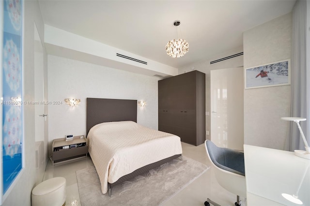 tiled bedroom with a notable chandelier