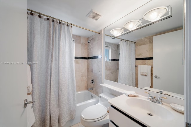 6767 Collins Ave Unit 602, Miami Beach, FL 33141 - bathroom featuring shower / bath combo, toilet, and vanity